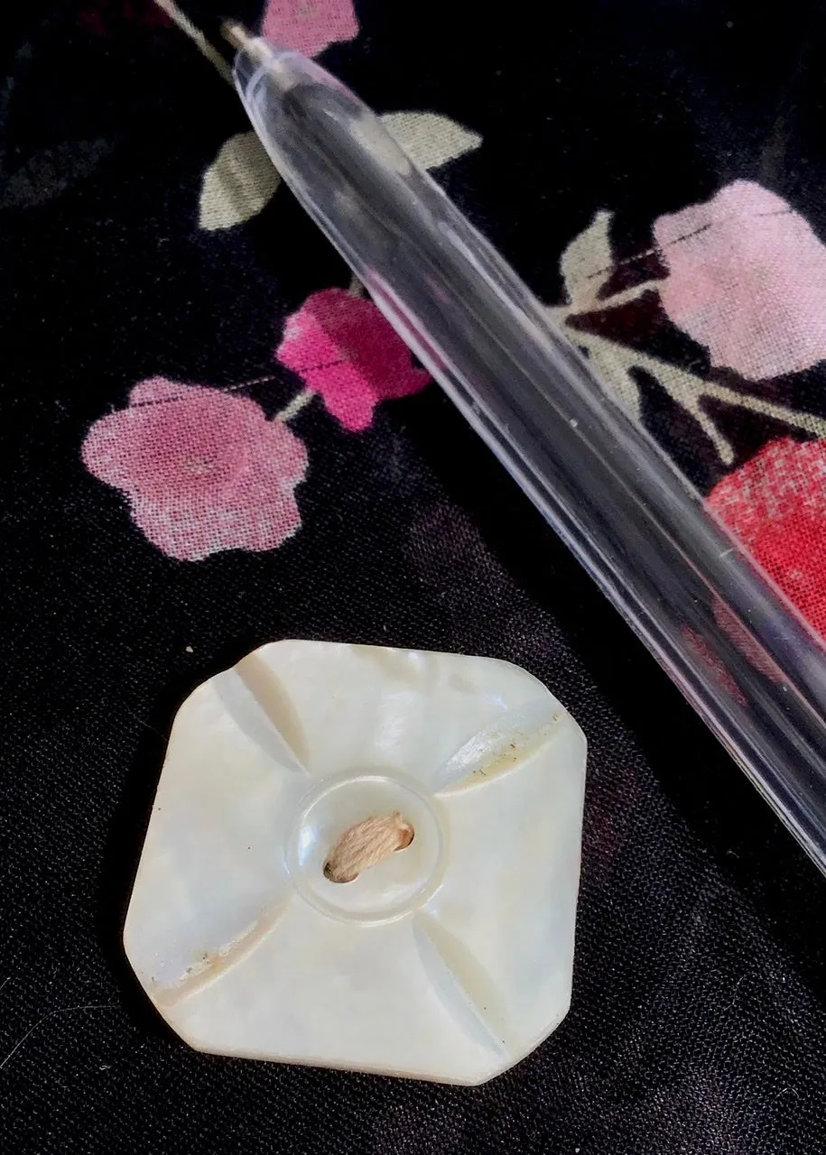 A Carved Deco Mother of Pearl Vintage Button