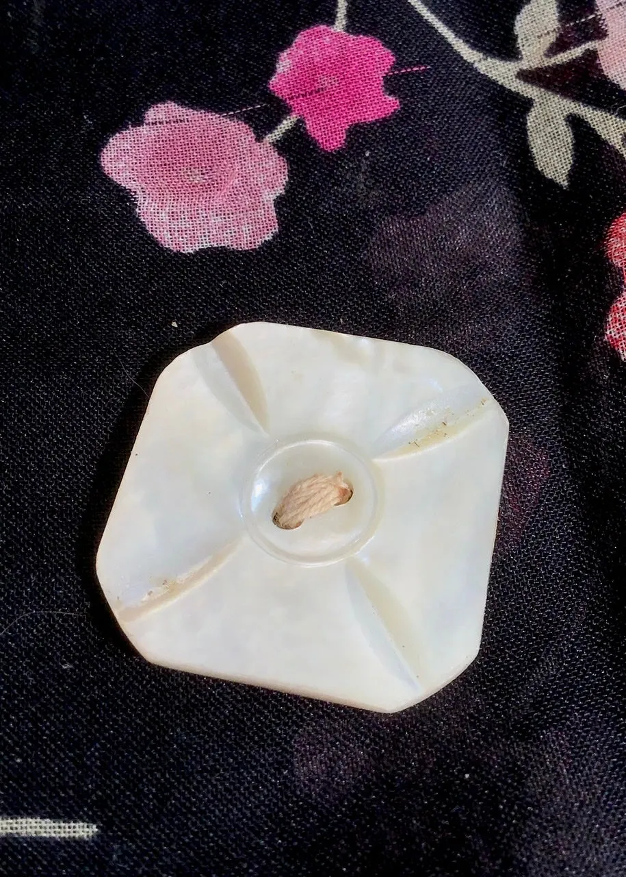A Carved Deco Mother of Pearl Vintage Button